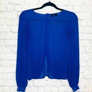 Petticoat Alley buttoned back split tulip blouse